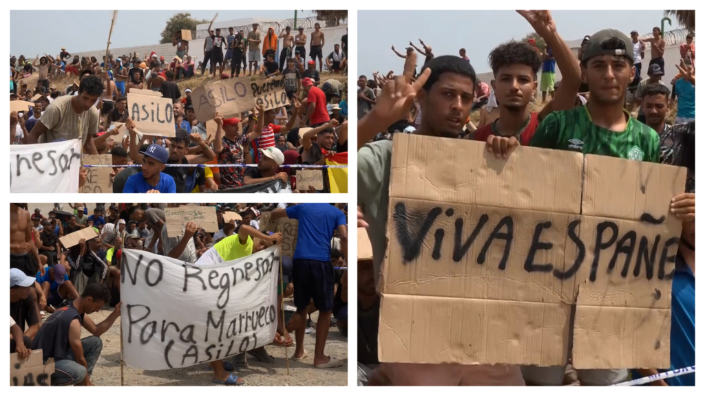 Con banderas de España y pancartas de «no regresar para Marruecos» decenas de migrantes piden el asilo en Ceuta
